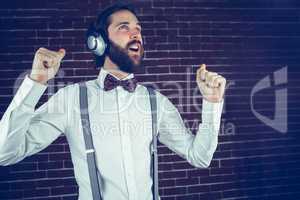 Hipster enjoying listening music