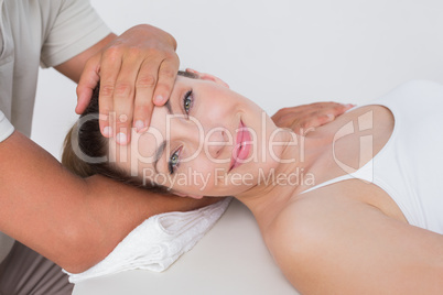 Woman receiving neck massage