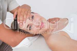 Woman receiving neck massage