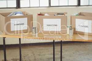 Cardboard donation boxes on table