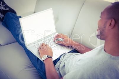 A man using his laptop