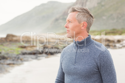 Man looking out past the shore