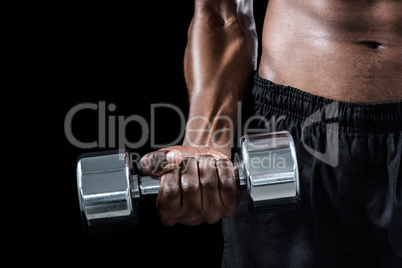 Cropped image of athlete exercising with dumbbell