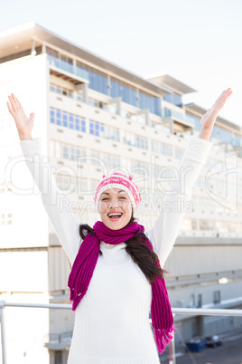 Happy woman looking around