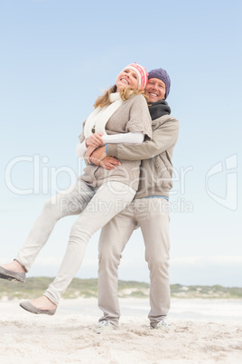 Happy couple holding each other