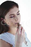 Pretty woman smelling alternative tincture