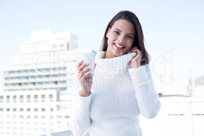 Beautiful brunette drinking a coffee