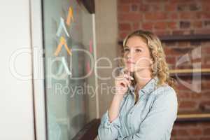 Thoughtful businesswoman in office