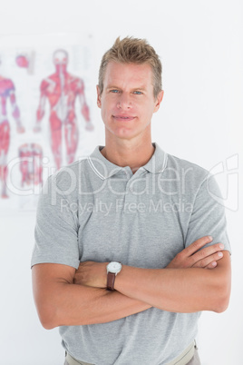 Doctor looking at camera with arms crossed