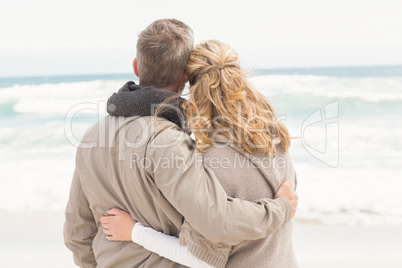 Happy couple holding hands while walking