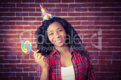 Cute model with hat and lollipop