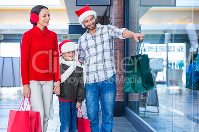 Happy family looking at camera