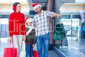 Happy family looking at camera