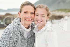 Mother and daughter looking at the camera