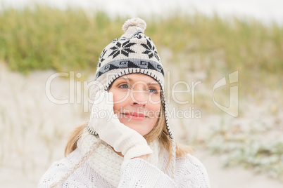 Smiling woman wearing a warm hat