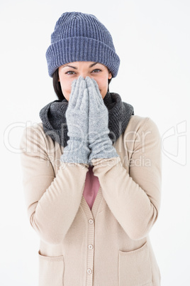 Smiling brunette wearing warm clothes