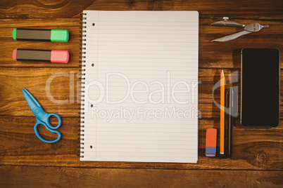 School supplies on desk with copy space