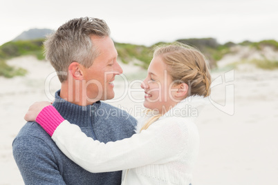 Father and daughter hugging each other