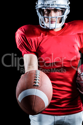 Sportsman showing American football