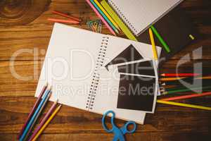 School supplies on desk with copy space