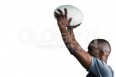 Athlete throwing rugby ball