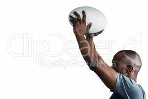 Athlete throwing rugby ball