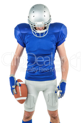 American football player looking down