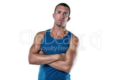 Serious athlete with arms crossed