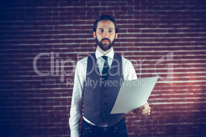 Confident man holding document