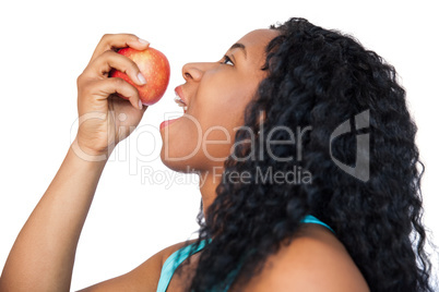 Model holding a red apple