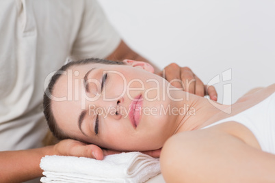 Woman receiving neck massage