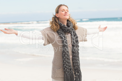 Smiling woman wearing winter clothing