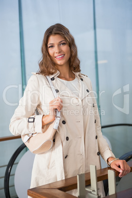 Portrait of smiling woman looking at camera