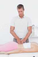 Physiotherapist doing back massage