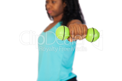 Woman exercising using dumbbells