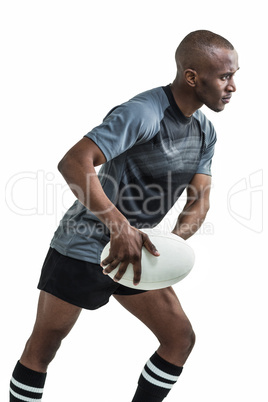 Sportsman throwing rugby ball