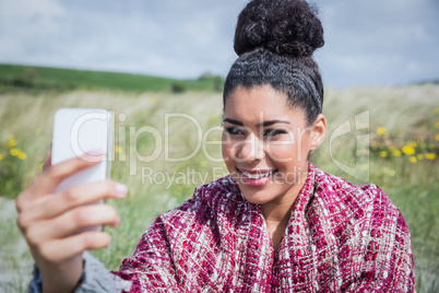 Beautiful woman using her smartphone