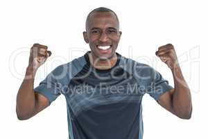 Portrait of rugby player cheering after success in game