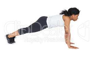 Fit woman doing push up