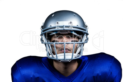 Portrait of determined American football player in uniform