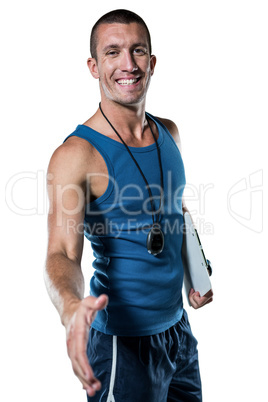 Happy personal trainer giving handshake