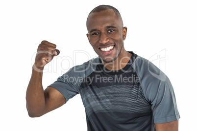 Portrait of sportsman cheering after success in rugby