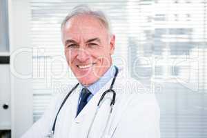 Portrait of happy doctor with stethoscope
