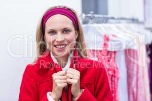 Smiling woman wearing red coat