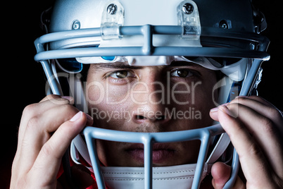 Close-up portrait of sportsman wearing helmet