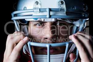 Close-up portrait of sportsman wearing helmet