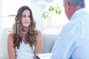 Psychiatrist advising female patient