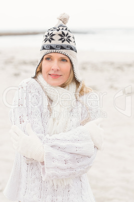 Smiling woman wearing a warm hat