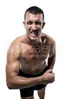 Excited shirtless athlete flexing muscles