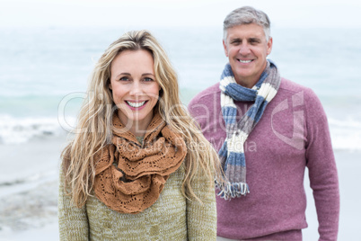 Happy couple standing beside one another